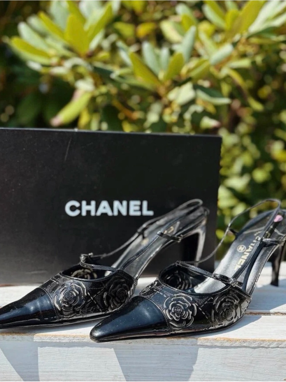 CHANEL Black Patent Leather Camellia Slingback Pumps